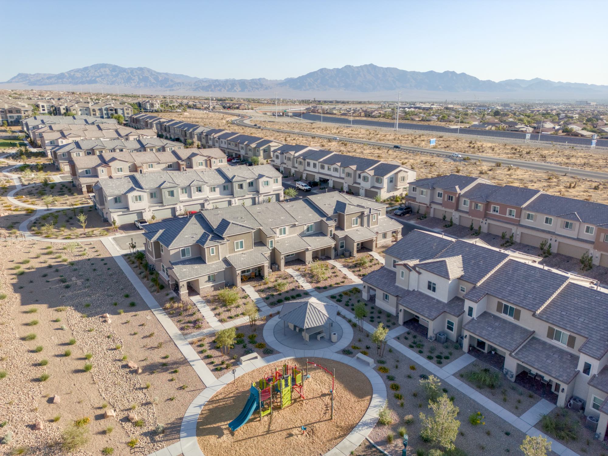 Aerial of the townhome rows at Centennial Heights around the shaded common area