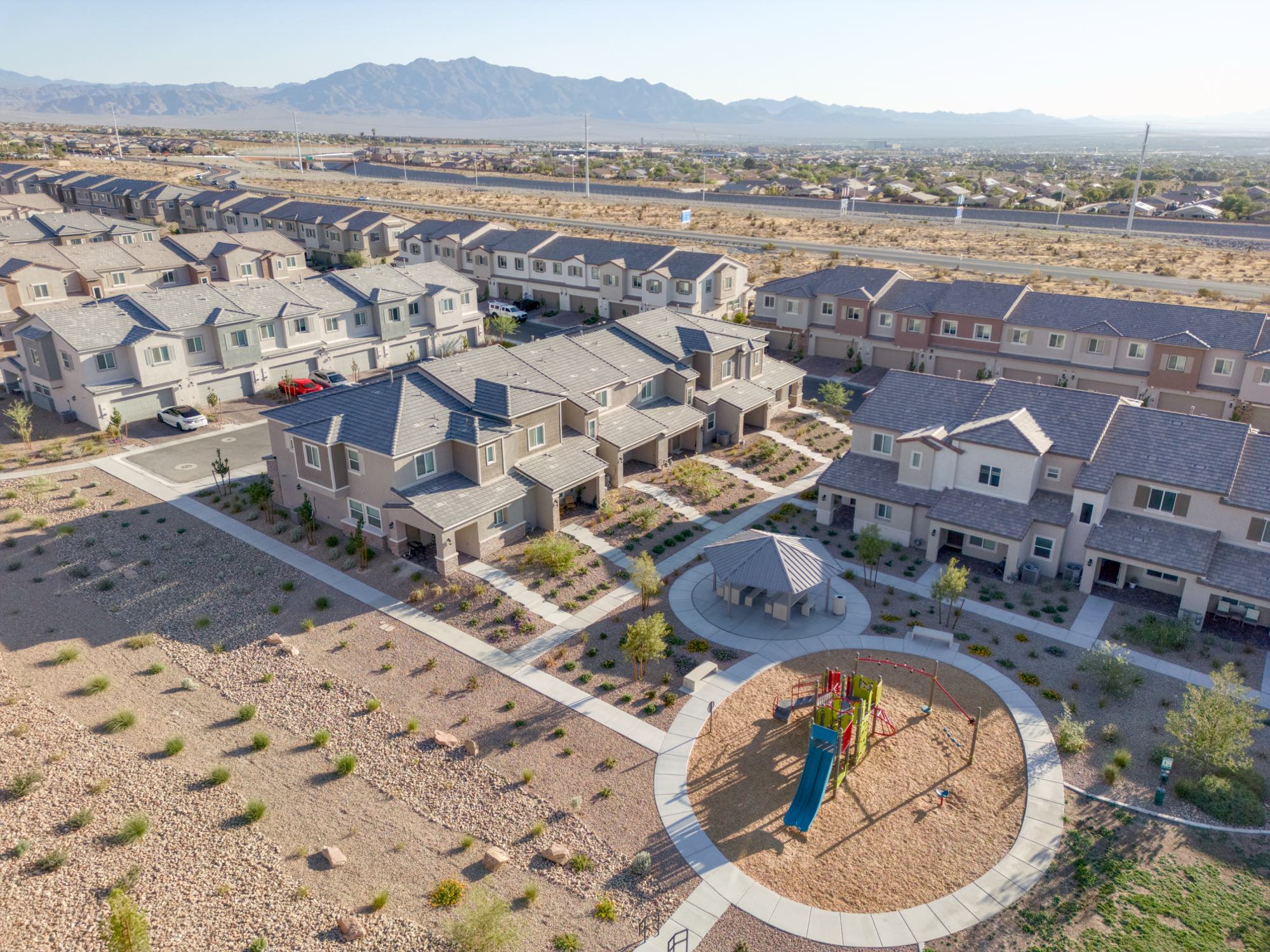 Aerial of the playground and shade ramada at the center of the Centennial Heights community